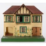 A Triang dolls house and furniture:.