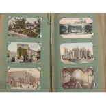 An early 20th century postcards album of