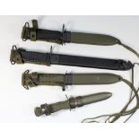 Three modern bayonets and a dagger:.