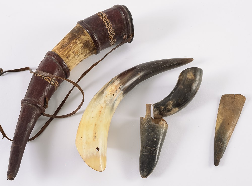 A collection of various horn and horn se