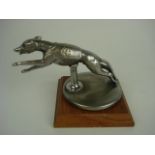 A leaping greyhound radiator cap mascot: