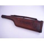 A leather leg 'o mutton gun case inscrib