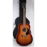 A Simon & Patrick twelve string guitar,