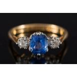 An 18ct gold, sapphire and diamond three