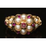 An antique gold, ruby and seed-pearl cir