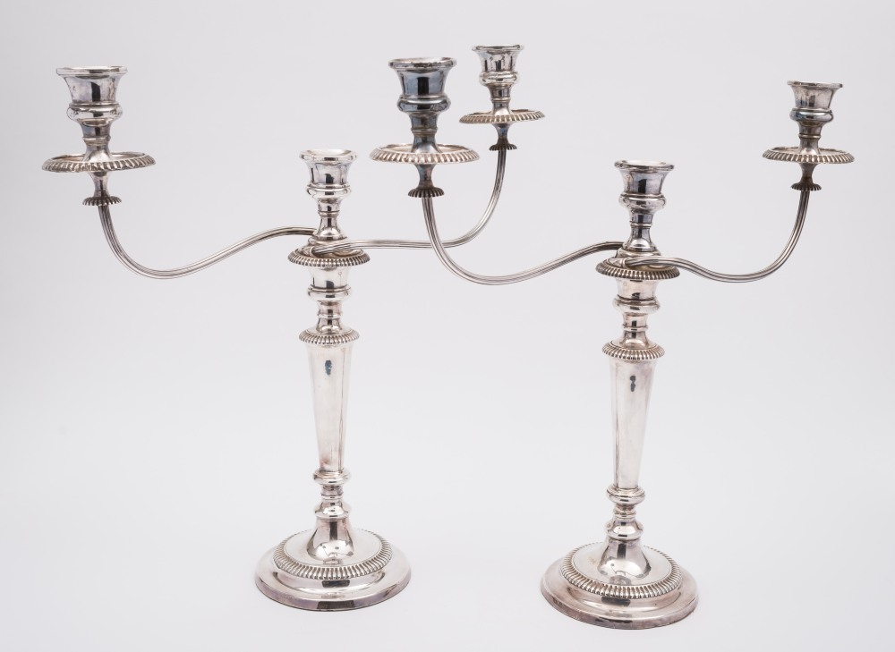 A pair of ep twin branch candelabra: the