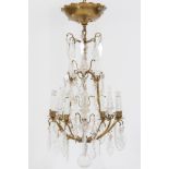 A gilt metal nine-branch chandelier: wit