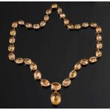 A late 19th century gold and topaz  rivi