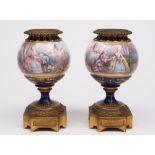A pair French porcelain and gilt brass m