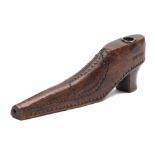 A 19th century treen pipe in the form of