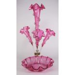 A cranberry glass epergne: with central