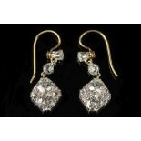 A pair of diamond mounted pendant earrin