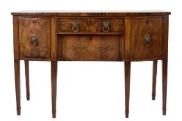 A Regency mahogany and inlaid bow fronte