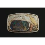 A boulder opal mounted rectangular brooc