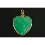 A heart shaped green jade pendant:, the