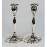 A pair of Elizabeth II silver candlestic