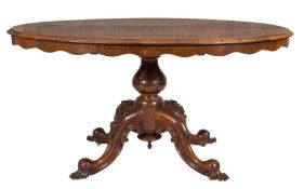 A Victorian rosewood oval breakfast tabl