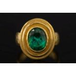 A 22ct gold and oval green tourmaline si