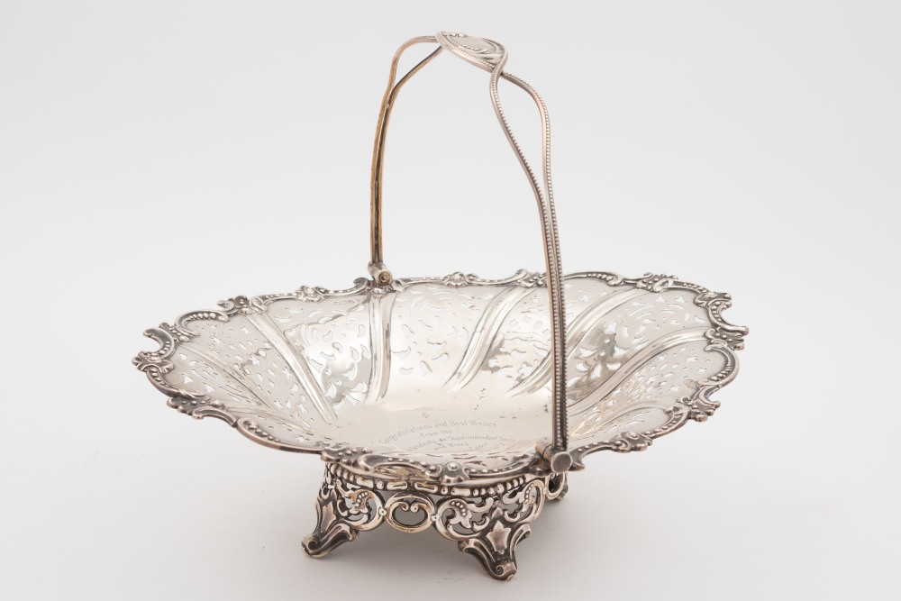 An Edward VII silver swing handled baske