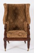 A Regency mahogany and upholstered wing