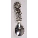 A Continental silver preserve spoon, bea