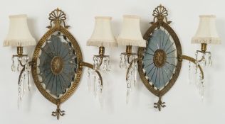 A pair of Regency-style gilt-brass giran