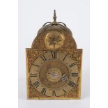 An 18th century brass lantern clock with