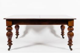 A Victorian mahogany extending dining ta