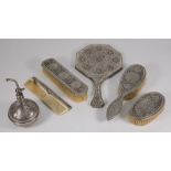 A Persian silver dressing table set: wit