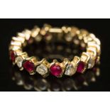 A modern, ruby and diamond eternity ring