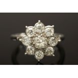 A diamond mounted cluster ring: mille-gr