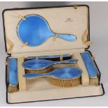 A George V silver and blue enamel dressi