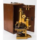 A lacquered brass monocular microscope by R J Beck Ltd, London, number 25624:,