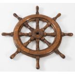 A  small teak ship's helm:, 64cm diameter.