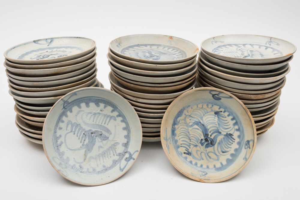 Tek Sing Cargo - fifty Chinese porcelain plates: painted in blue with a stylised phoenix within a