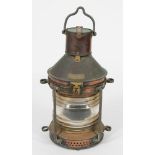 A ship's copper and brass anchor signal lamp by William McGeoch and Co Ltd, Glasgow,