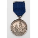 Marine Society reward for Merit medal:, obverse with Britannia holding the hand of a young man,
