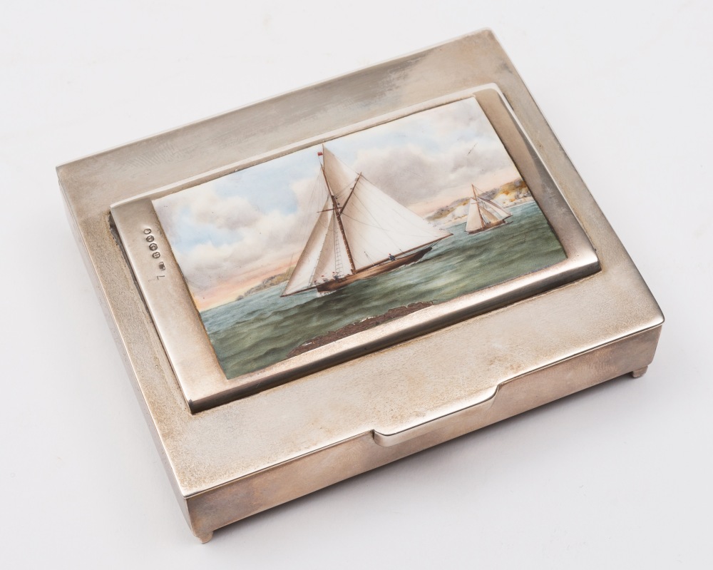 A Victorian silver and enamel panel of a yacht, Birmingham 1887, mounted on a Mexican silver box:,