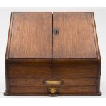 Of Devonport interest- A Victorian oak stationary cabinet presented to Rev C R Teupe,