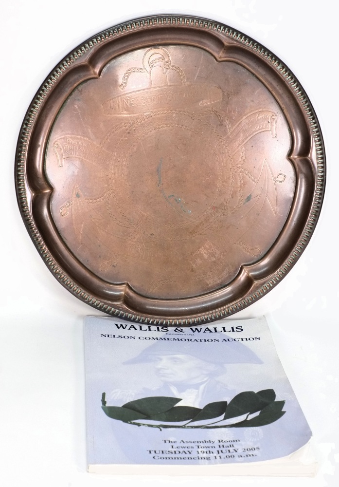 A circular copper 'Nelson's Victory Centenary Memento' tray:,