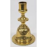 A ship's brass candlestick: with weighted base,