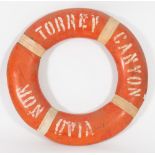 An orange life preserver from the SS Torrey Canyon:, signed as per title to both sides,