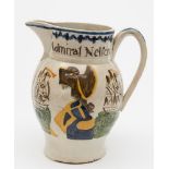 An early nineteenth century Staffordshire pottery Admiral Nelson commemorative mug: one side with