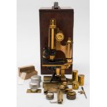 A 20th century lacquered brass microscope by Ross of London:,