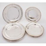 A collection of twelve Cunard Steamship Company silver plated dinner and side plates by Elkington,