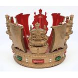 An Admiralty pattern cast aluminium crown:, painted in colours on a gold ground, 18cm high,