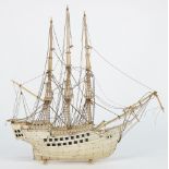 A 19th century bone and ivory prisoner-of-war style model of a 34 gun ship:,