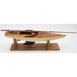 A model pond yacht on stand:,