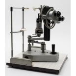 An optometrist's 'Diag 3 Portable' table top slit lamp, by Clement Clarke International:.
