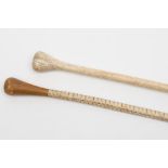 A marine ivory walking cane, together with a fish vertebrae walking cane:,